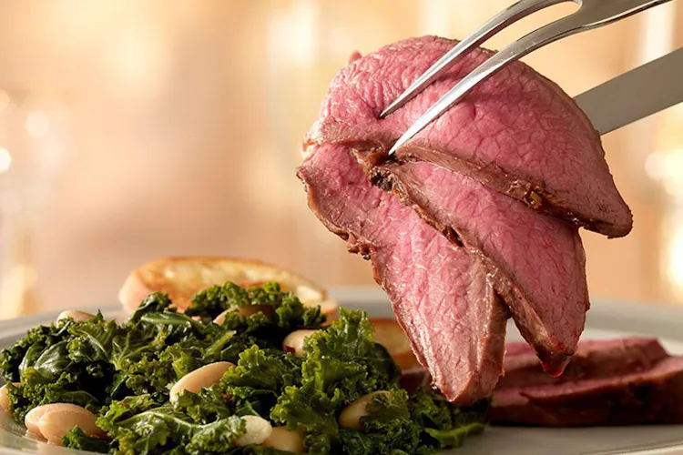 Rosemary Leg of Lamb with Warm Kale and White Beans | Red Meat Recipes