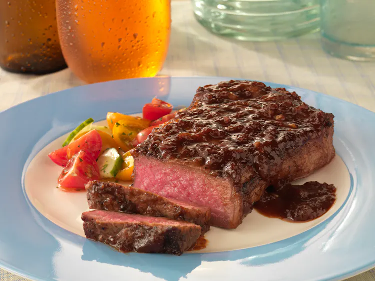 Strip Steaks with Bourbon-Molasses Barbecue Sauce | Red Meat Recipes