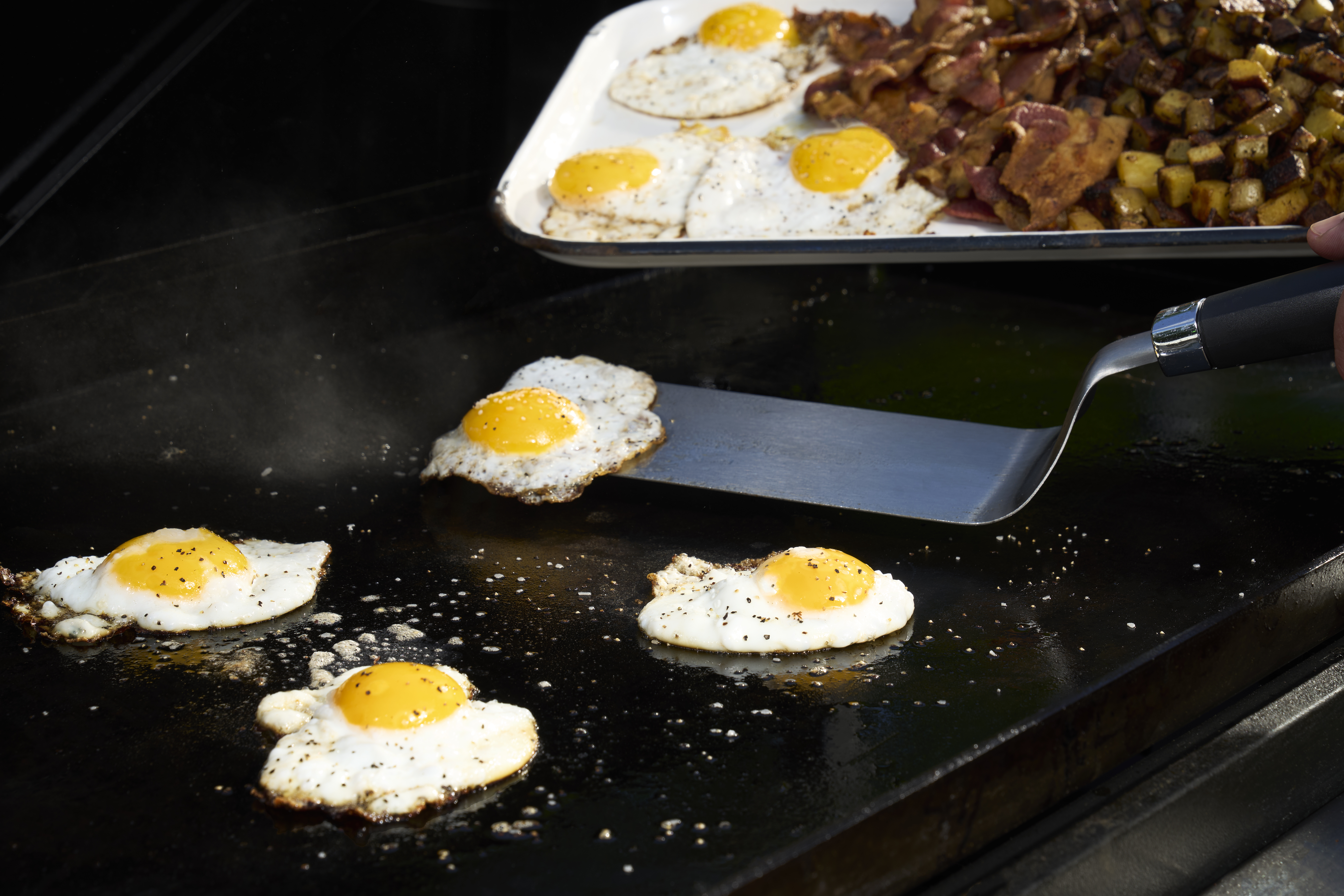 Griddled Breakfast with Bacon, Potatoes, and Eggs 