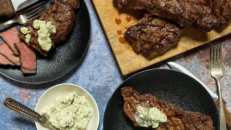 https://ux2cms.imgix.net/images/Recipes_US/NY-Steaks-with-Blue-Cheese-Butter.jpeg?auto=compress,format&w=750