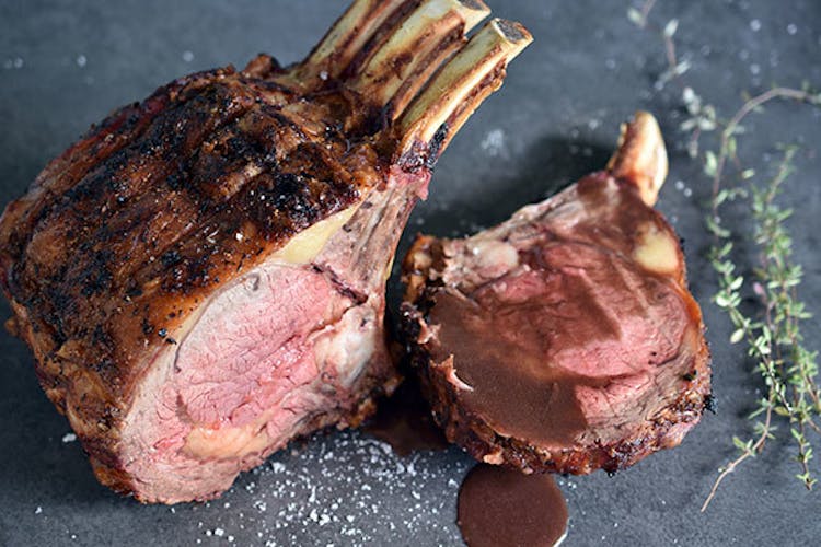 https://ux2cms.imgix.net/images/prime-rib-roast-with-thyme-jus-1.jpg?auto=compress,format&w=750